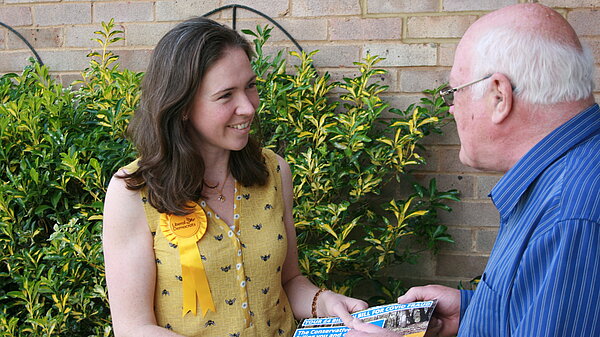 Anna talking to a voter on the doorstep